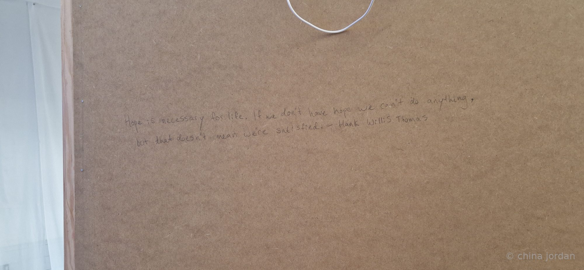 Pencil inscription — Hank Willis Thomas quote on hope